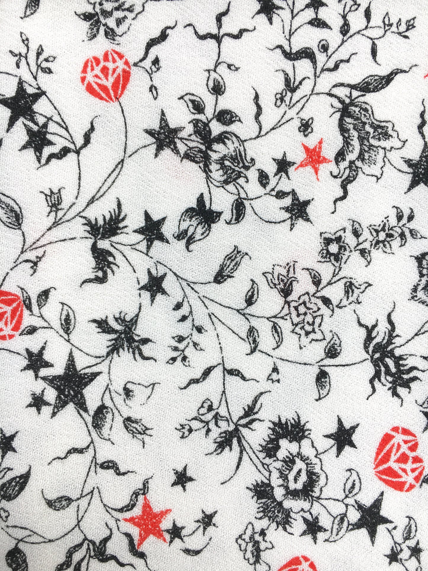 tissu viscose imprimé fleuri rock blanc et noir