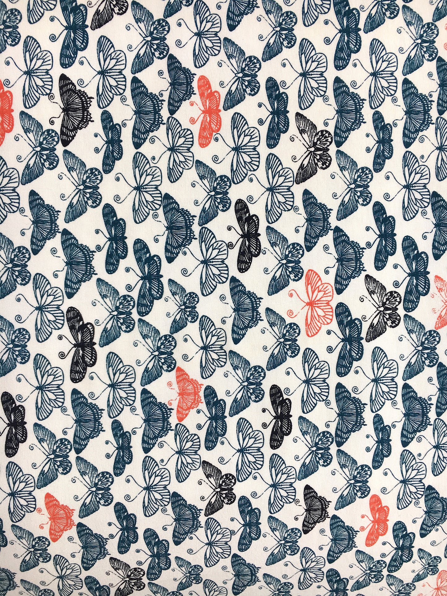 Tissu viscose imprimé papillons bleu rouge fond blanc