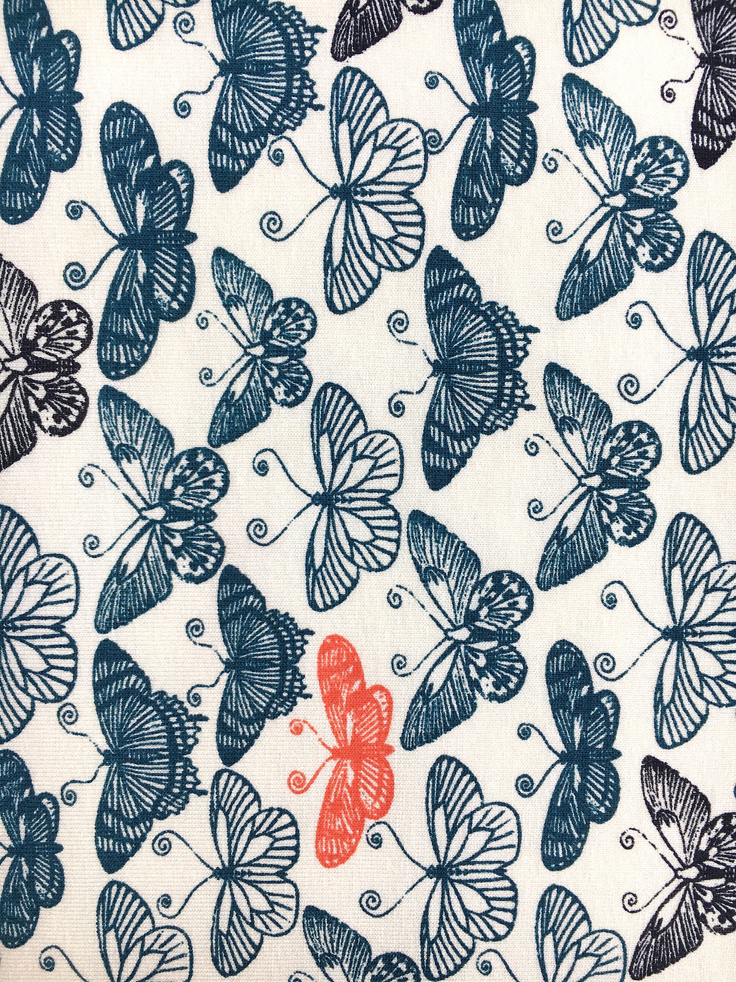 Tissu viscose imprimé papillons bleu rouge fond blanc